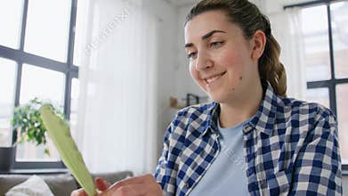woman making paper craft at home
