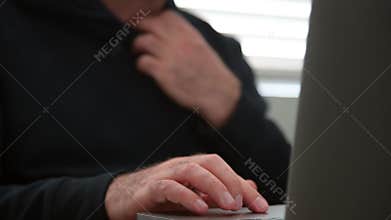 Person watching porn on laptop