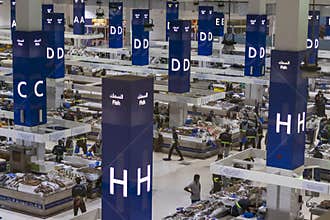 Dubai, UAE - 07.07.2021 - Customers and vendors at Waterfront market, fish section. Trading