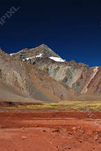 Landscape with mountains and volcanic ground