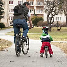 Father and child cycling