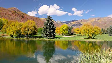 Scenic mountain lake with colorful autumn trees, Wasatch mountains
