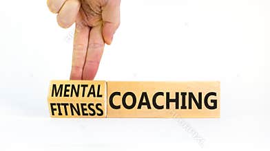 Mental or fitness coaching symbol. Coach turns cubes and changes words Fitness coaching to Mental coaching. Beautiful white