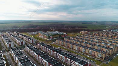 Apartment buildings and school in contemporary city district