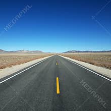 Highway stretching towards horizon.