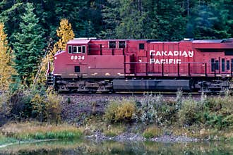 Canadian Pacific train passes over Mule Shoe. banff National Park Alberta Canada