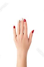 Female hand with golden nail design. Red nail polish manicure. Female hand isolated on white background