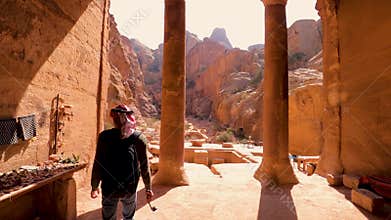 Ancient tomb-houses on the way to the Ad-Deir temple in Petra, Jordan.