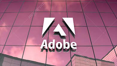 Editorial Adobe logo on glass building.