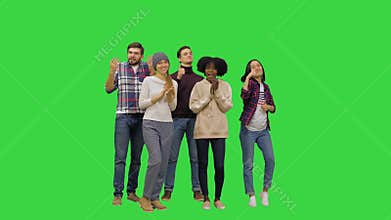 Thumbs up Great job, people congratulating someone behind the camera with a complete success on a Green Screen, Chroma