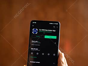 Assam, india - March 10, 2021 : CoWIN app logo on phone screen stock image.
