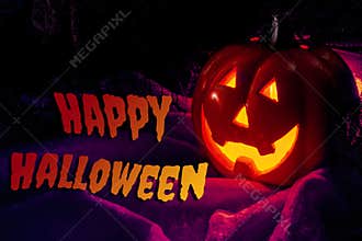 Halloween party and fall holidays concept with lit jack o`lantern pumpkin with scary glowing eyes and creepy smile lighting the