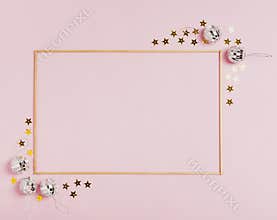 Cute frame with christmas balls pink background. High quality and resolution beautiful photo concept