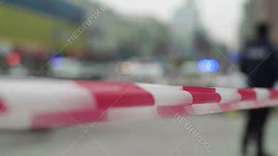 Police barrier: warning police tape at the crime scene.