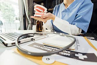 Medical technology concept The doctor works with mobile phones, headphones and tablets