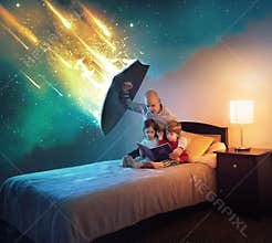 Father reads to children while holding shield