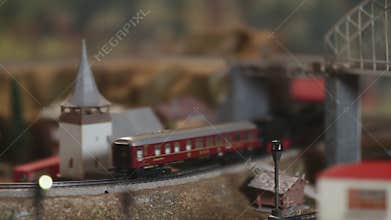 Locomotive and wagons coming down the hill and going to the train station