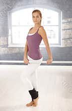 Dancer girl at ballet bar