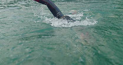 Triathlete Swim Workout Preparing To Triathlon Competition.Professional Swimmer Training For Triathlon Competition In