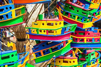 Bright colorful display of toy boats.