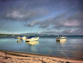 Boats anchored on a lake in Michigan.