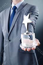 Businessman with star award