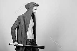 aggression and anger. sport activity. full of energy. Sport. Hooligan macho hits the bat. Bandit gang and conflict. man