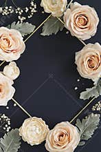 Light orange flowers frame on blue background