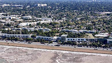 Meta MPK 21 aerial view with cityscape and natural landscape