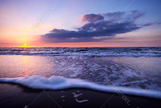 Waves on the beach at night
