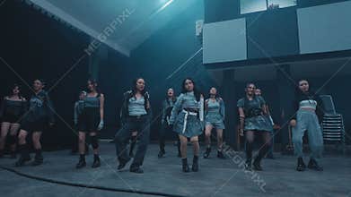 Synchronized dance performance in studio