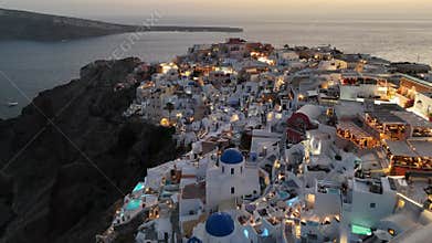Aerial view of Oia village at sunset, Santorini island, Greece