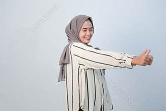 Body expression of Indonesian Asian woman wearing hijab