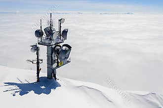 The Watchtower Over a Wintery Cloudscape and snow on the peak in winter season