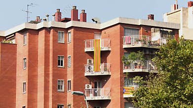 Residential House with Several Catalan Flags Hanging