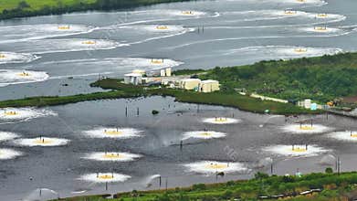 Industrial water use at cellulose and paper plant. Sediment aeration pond at Brunswick factory in Georgia, USA. Toxic