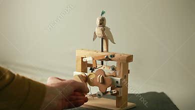 Parrot flaps its wings turns its head, funny wooden toy