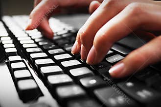 Fingers on keyboard