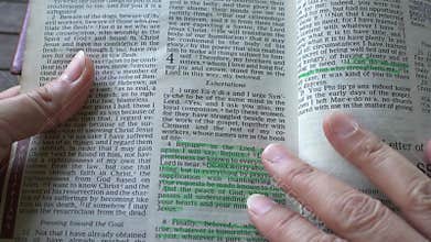 Book of Philippians of the new testament in the Holy Bible.Turning page to chapter 4.