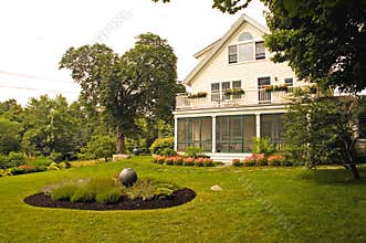 House with summer landscaping