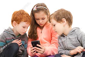 Group of kids using smartphone