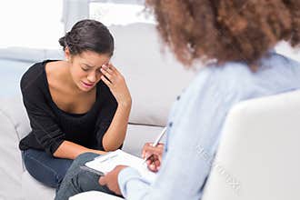 Woman getting depressed in therapy