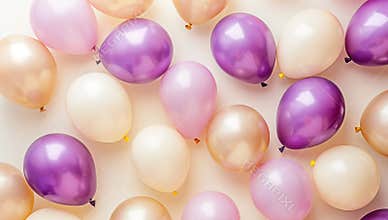 Pink and purple balloons create a vibrant display on a white background