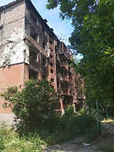 A multi-storey residential building in Mariupol destroyed during the fighting