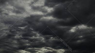 The skies. Fast moving clouds on the blue sky