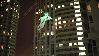 Flying helicopter ghost at night near residential