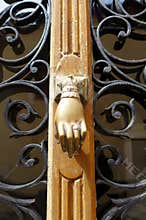 Antique door knocker hand