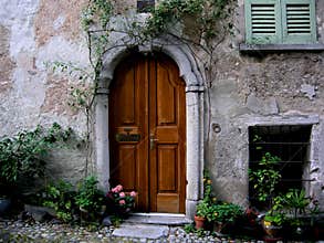 Arched entrance door Tuscany italy