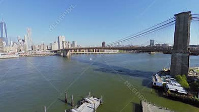 Cityscape with traffic on Brooklyn Bridge across