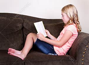 Teen reading a book
